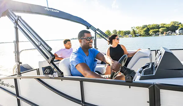 captain smiles driving hurricane fundeck 2260 ref ob