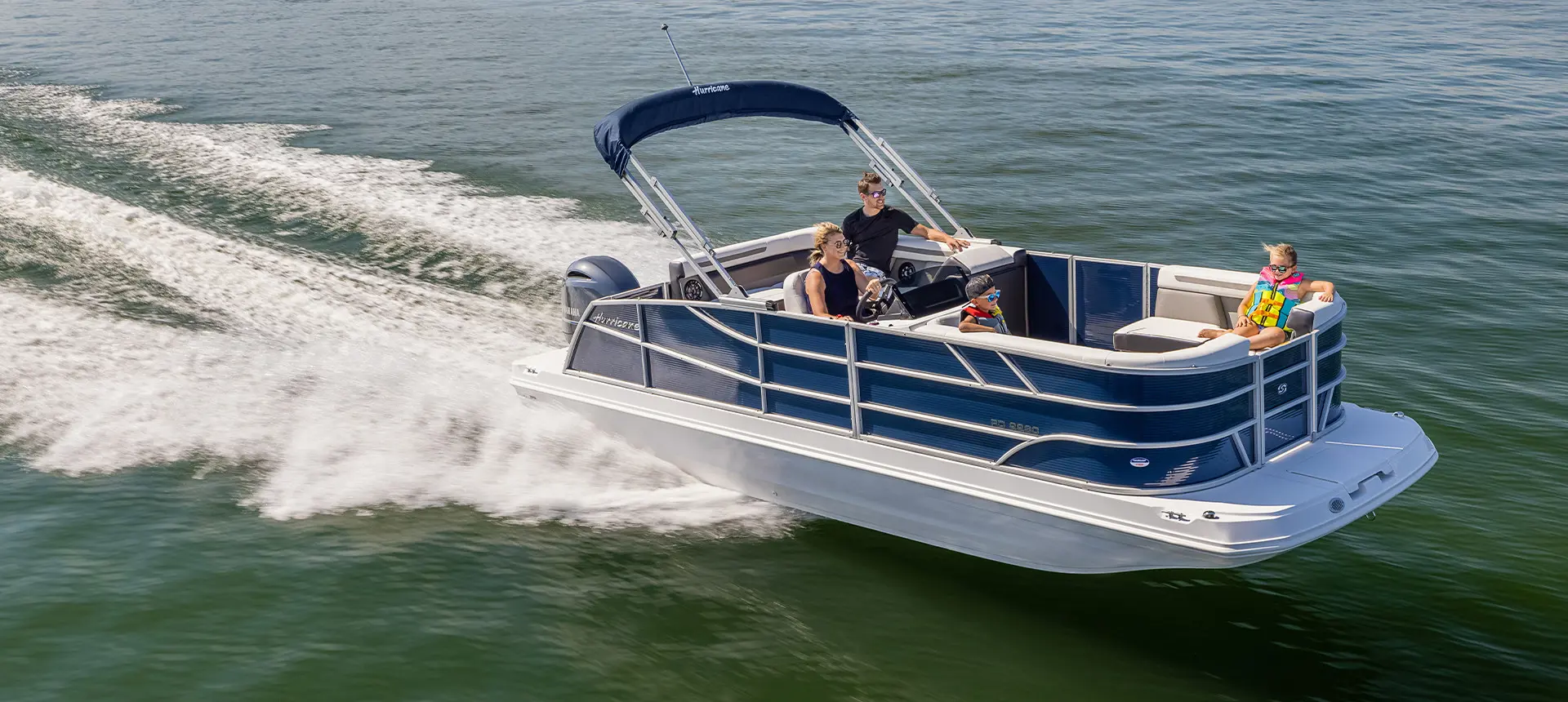 hurricane fundeck 2260 re ob cruising on water