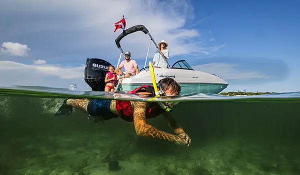 man swims aside hurricane sundeck 187 ob