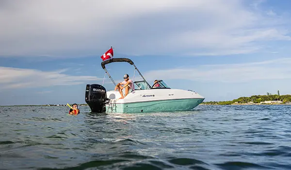 family swims near parked hurricane sundeck 187 ob