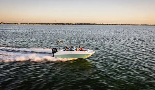 side view of hurricane sundeck 187 ob on a sunset cruise