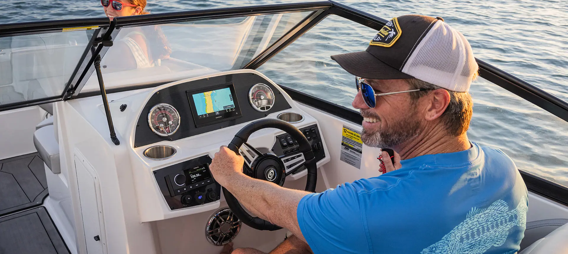 captains chair and dashboard of hurricane sundeck 235 ob