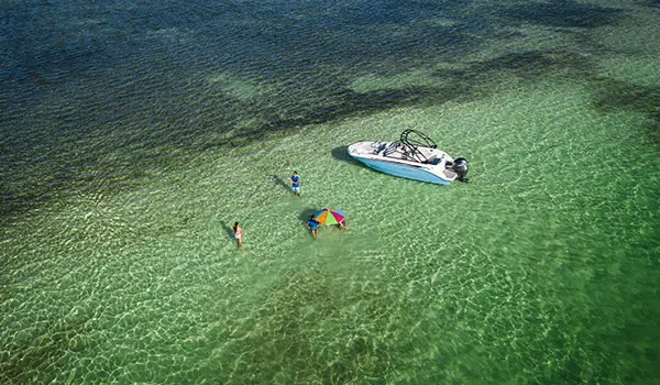 overhead view of family swimming around hurricane sundeck 235 ob
