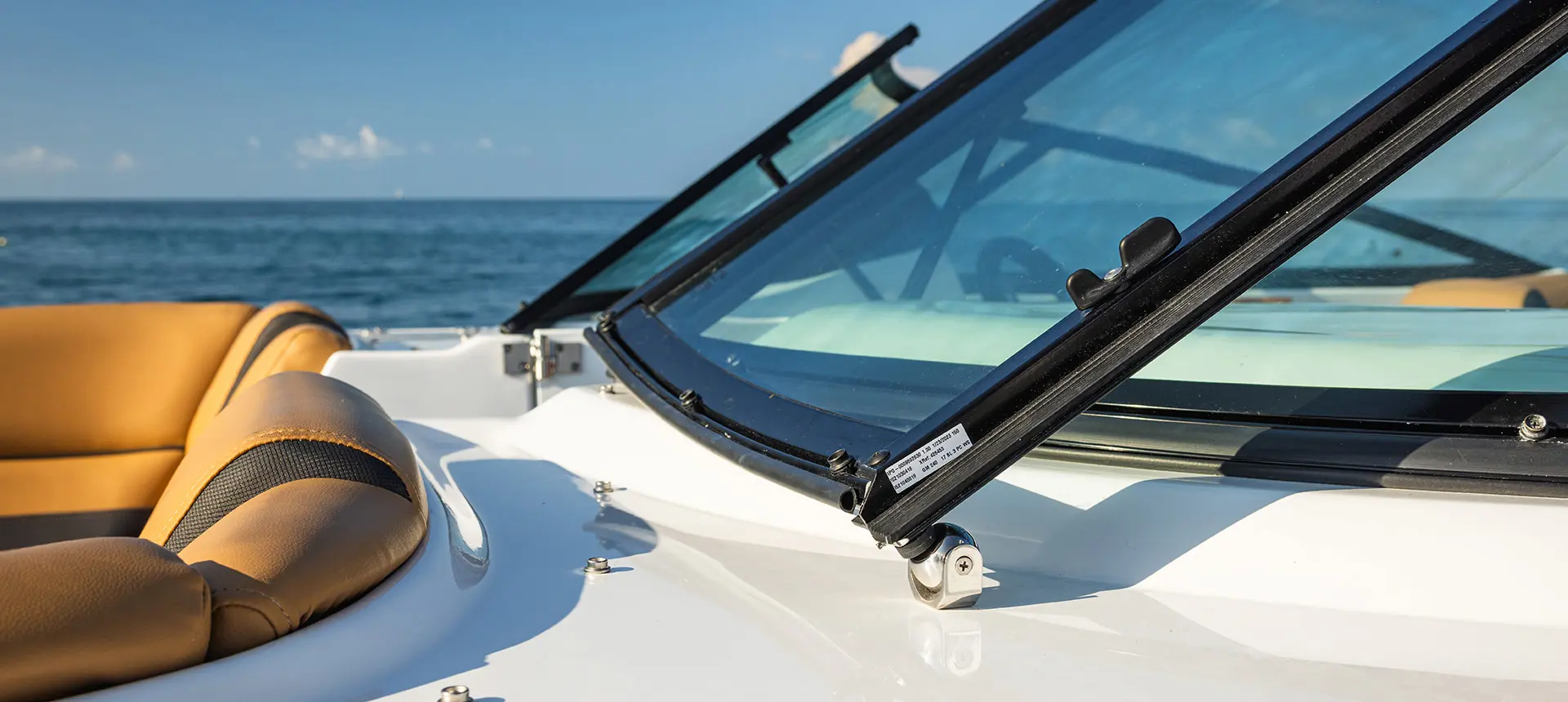 Windshield detail on a Hurricane SunDeck 2486 OB.
