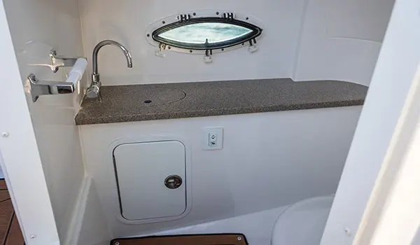 Bathroom sink and counter on a Hurricane SunDeck 2486 OB.