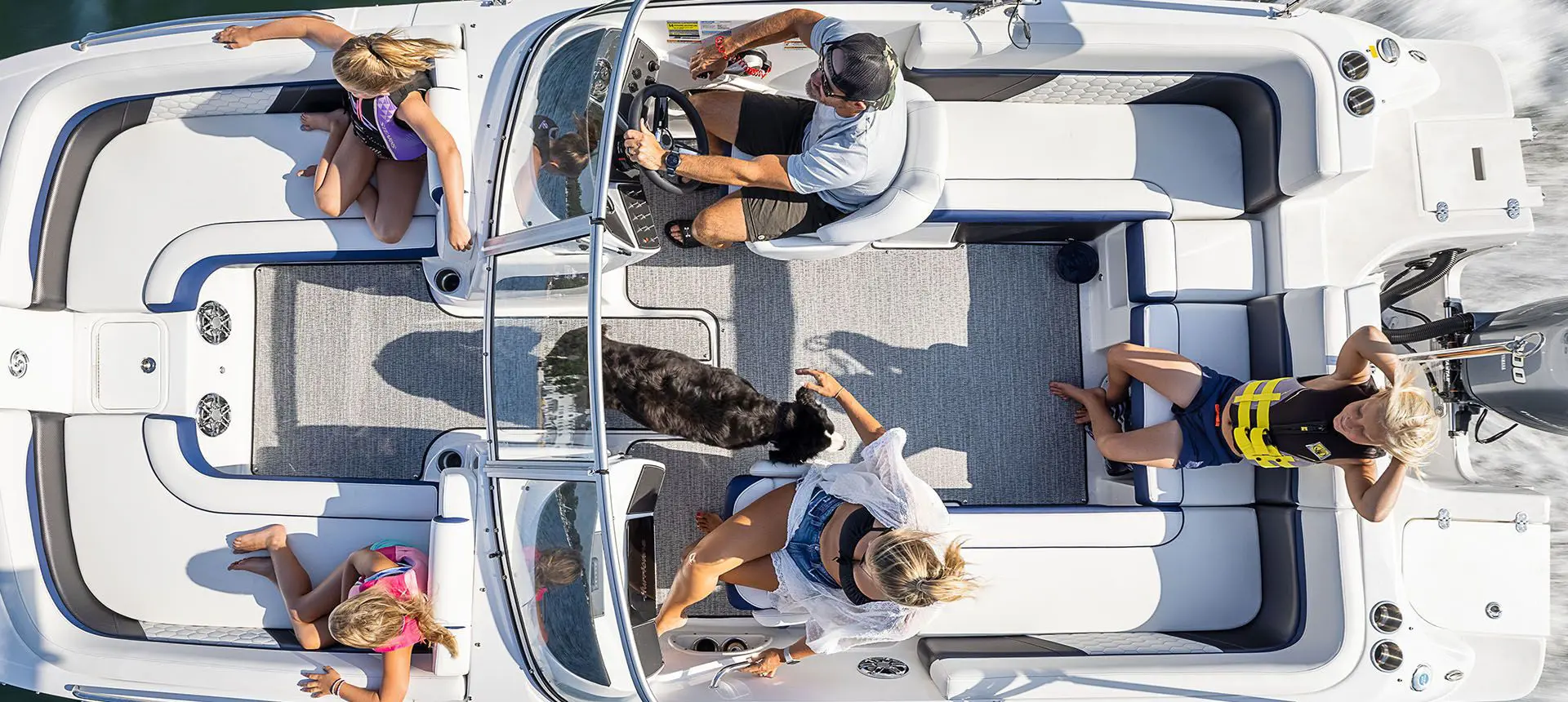 aerial view of a family on a hurricane sundeck ob boat
