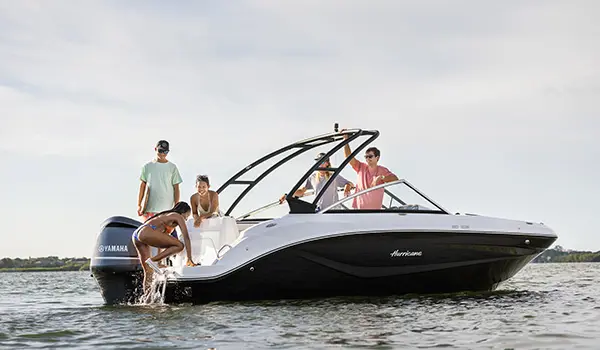 wakeboard rider boards hurricane sundeck 235 ob after being towed