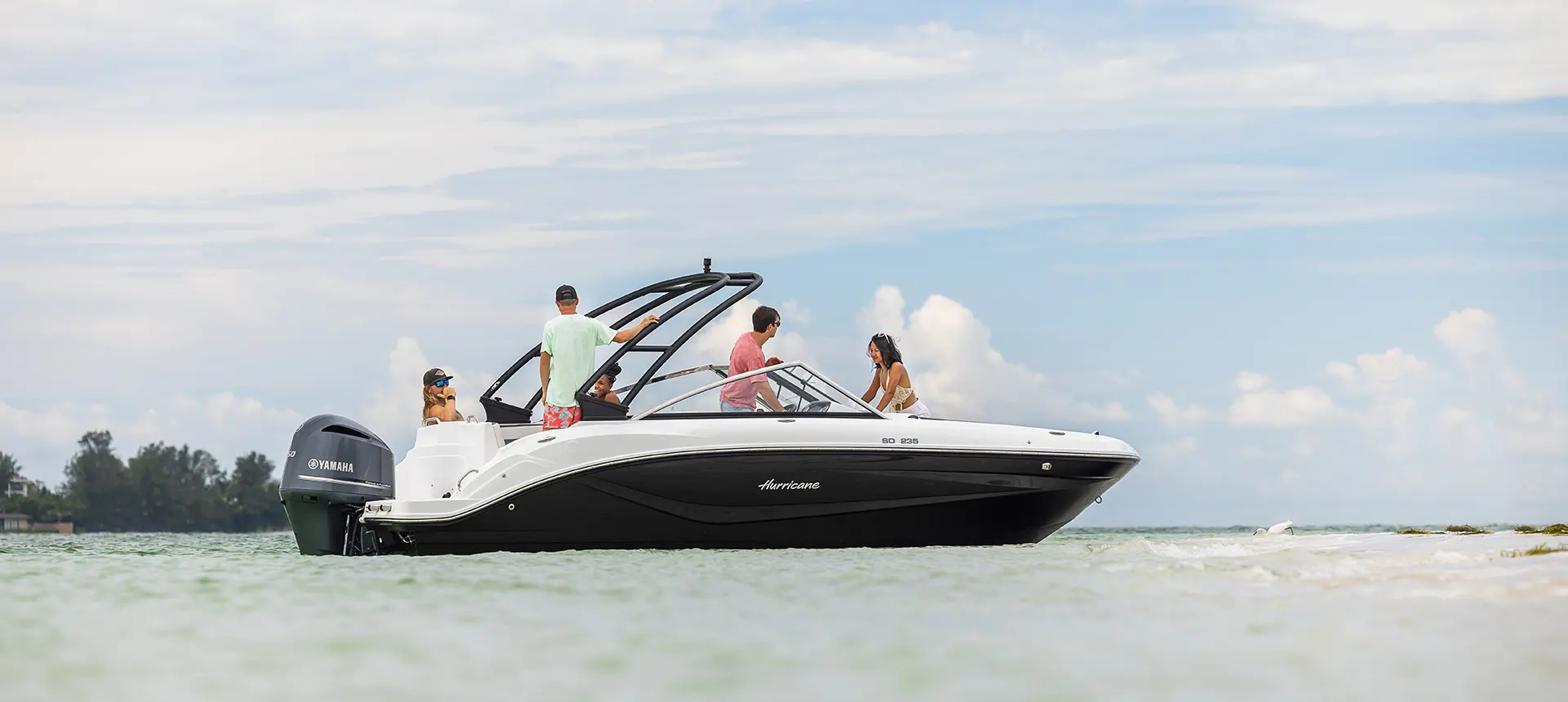 side view of group lounging on a hurricane sundeck 235 ob