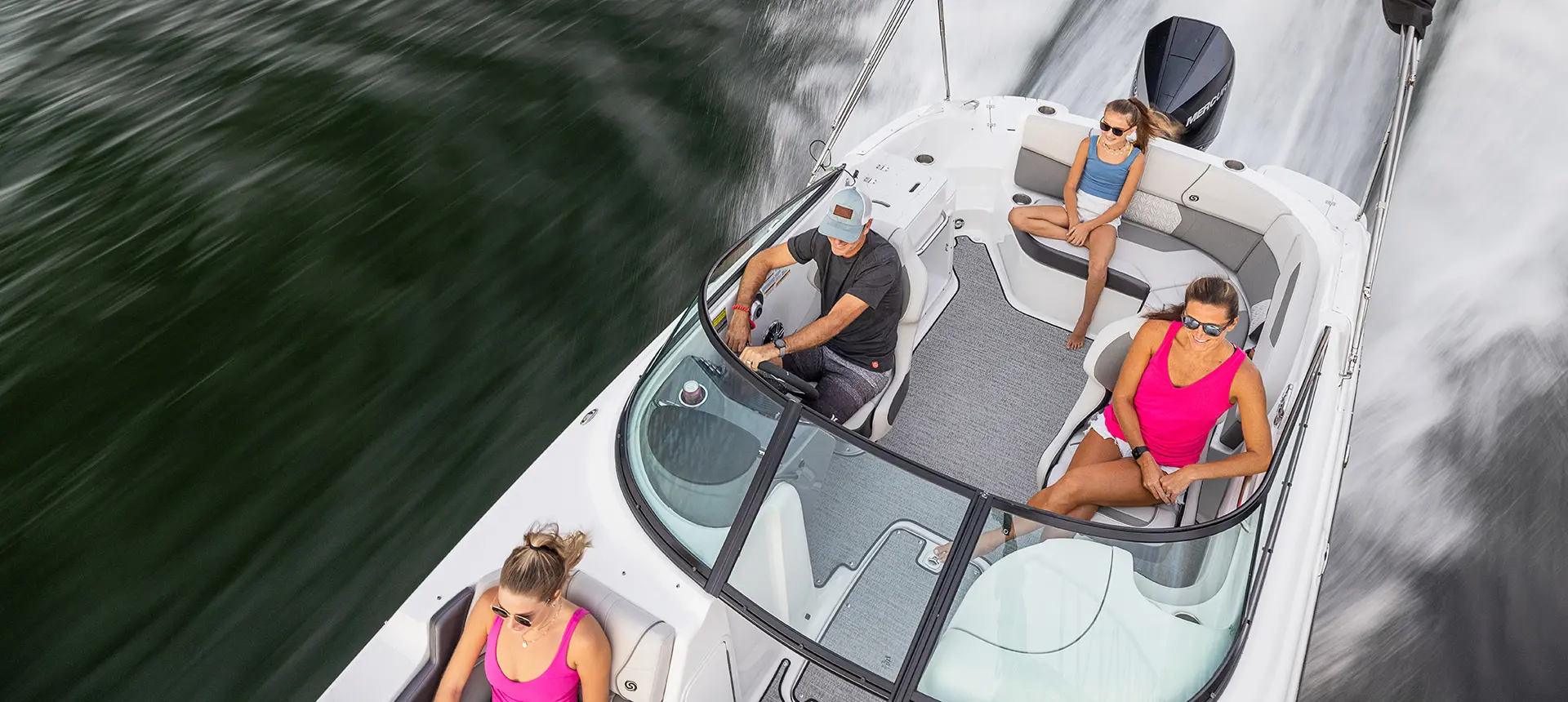 overhead view of a family relaxing comfortably on a hurricane sundeck 2400 ob deck boat