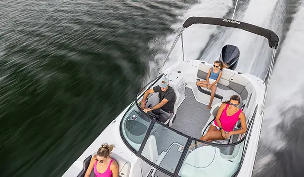 overhead view of a family relaxing comfortably on a hurricane sundeck 2400 ob deck boat