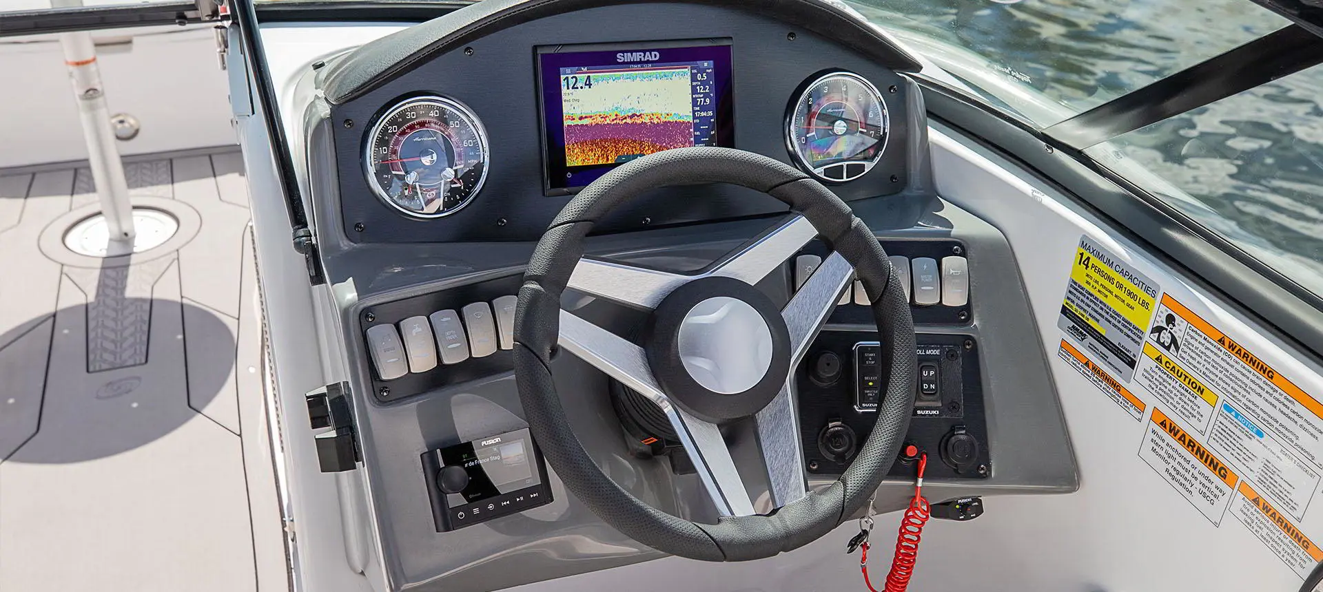 Driver's console on a Hurricane SunDeck 2486 OB.