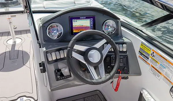 Driver's console on a Hurricane SunDeck 2486 OB.