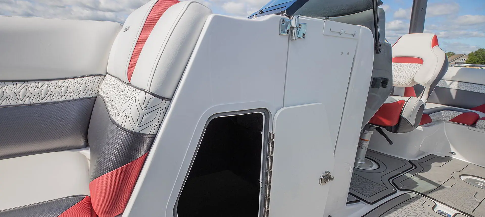 Storage compartment opening on a Hurricane SunDeck 2486 OB.