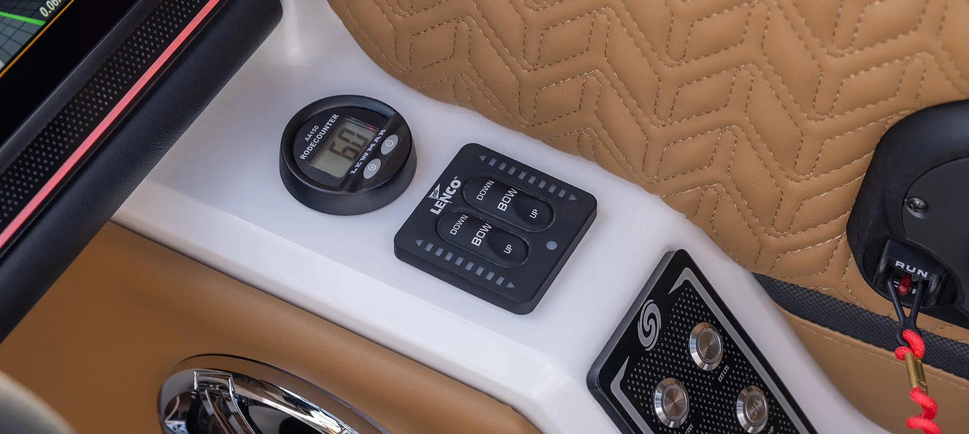 switches on the helm of a hurricane sundeck 2600 ob deck boat