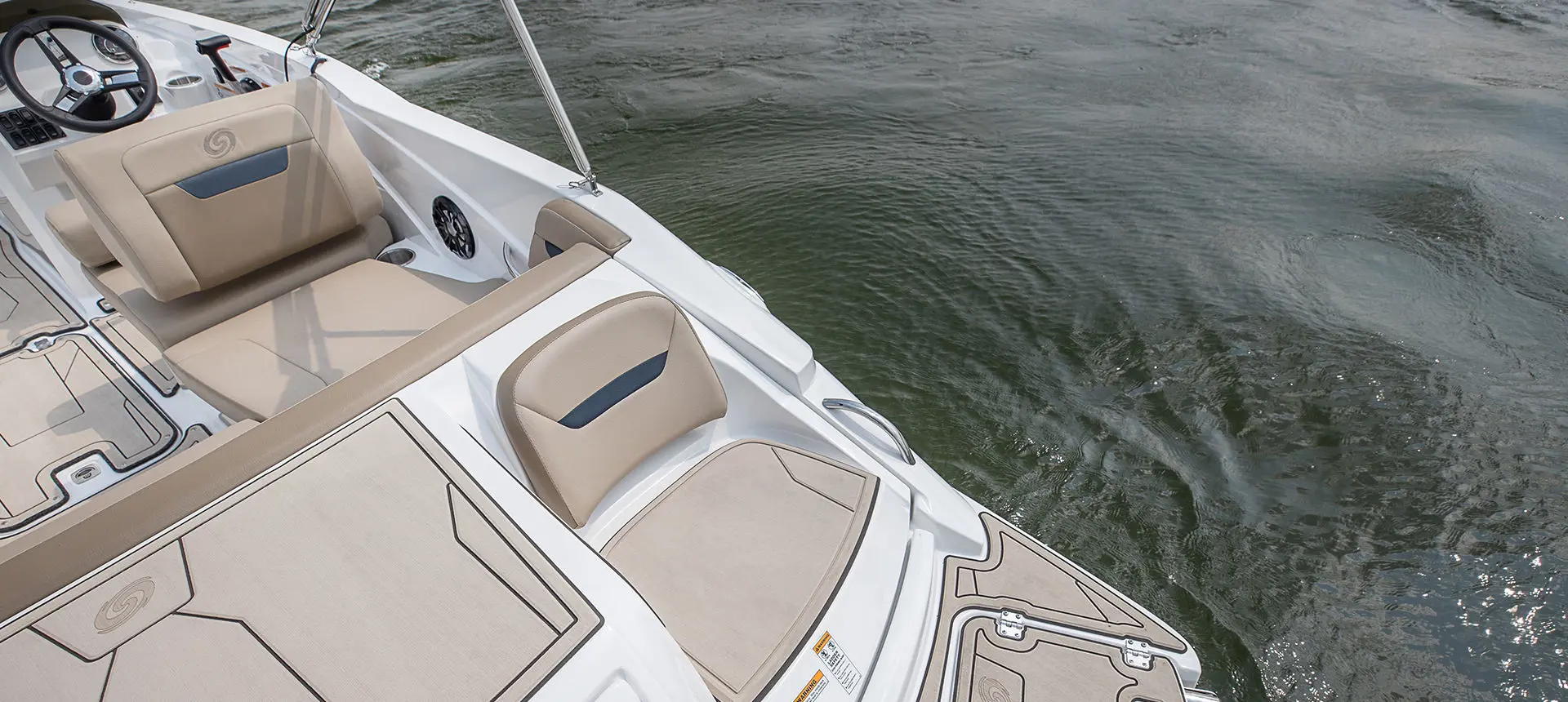Stern seating near the swim platform on a Hurricane SunDeck Sport I/O deck boat.