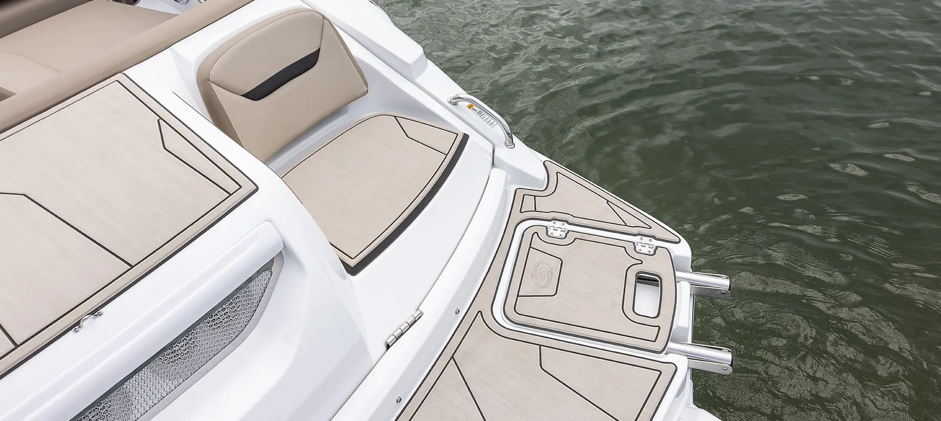 Stern seating and swim platform on a Hurricane SunDeck Sport I/O deck boat.
