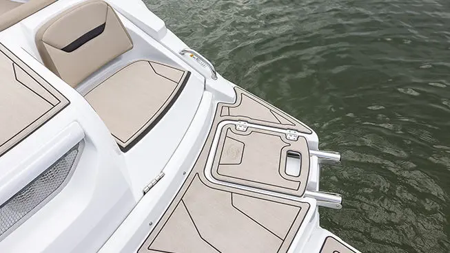 Stern seating and swim platform on a Hurricane SunDeck Sport I/O deck boat.