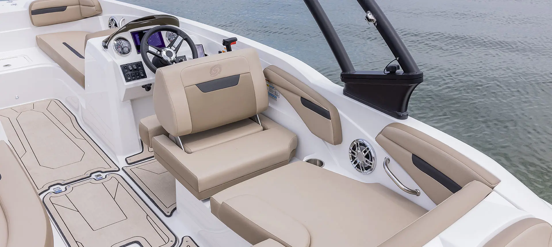Swingback captain's chair and stern seating on a Hurricane SunDeck Sport I/O deck boat.