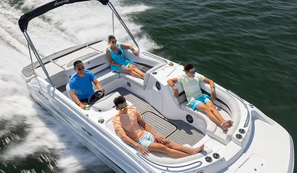 Overhead view of family cruising on a Hurricane SunDeck Sport 188 IO deck boat.
