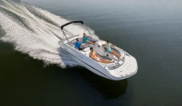 Aerial view of a family cruising on a Hurricane SunDeck Sport 188 IO deck boat.