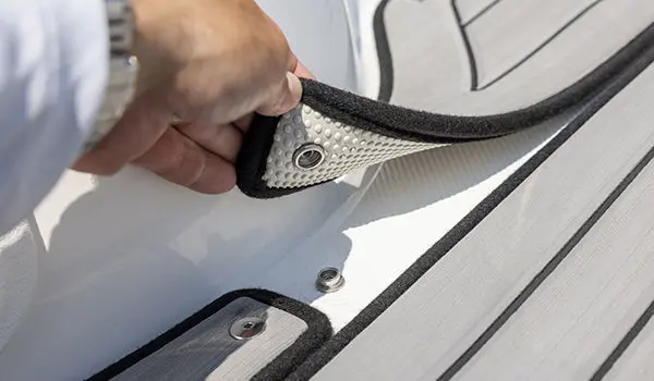 Detachable flooring on a Hurricane SunDeck Sport 188 IO deck boat.