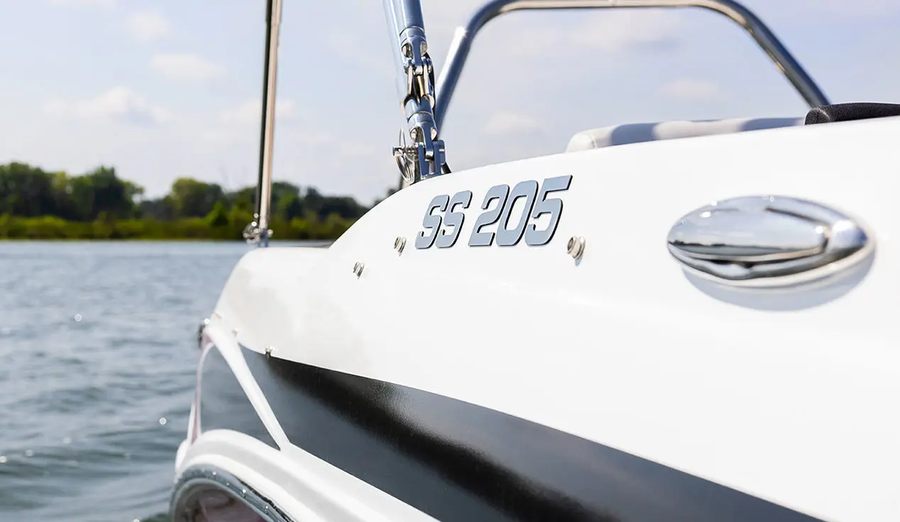 SS 205 branding on a Hurricane SunDeck Sport OB boat.