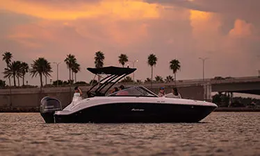 friends enjoying the ocean on a hurricane boat