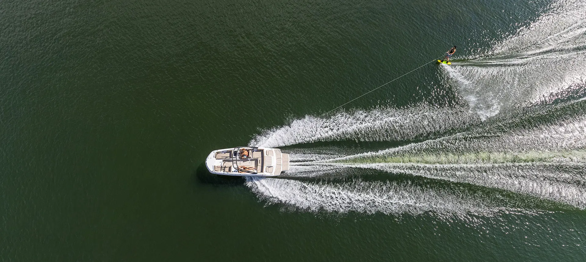 wake boarder behind a hurricane sport boat