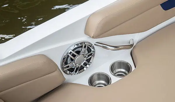 Integrated speakers and cup holders on a Hurricane SunDeck Sport 185 OB deck boat.