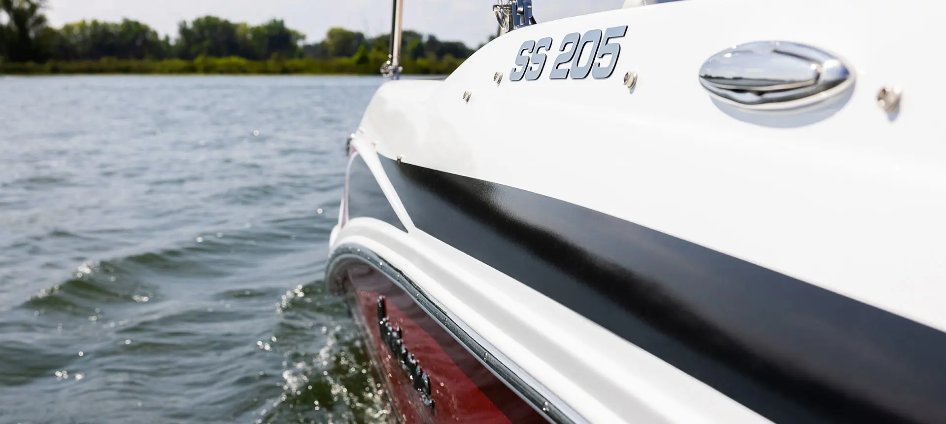 SS 205 badging on a Hurricane SunDeck Sport 205 OB deck boat.