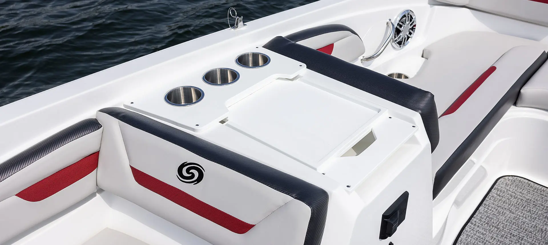 Cup holders and table on a Hurricane SunDeck Sport 205 OB deck boat.