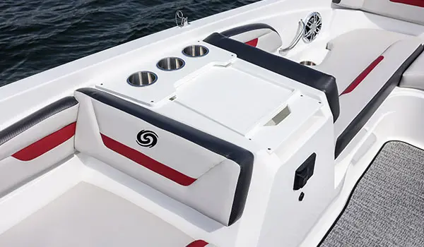Cup holders and table on a Hurricane SunDeck Sport 205 OB deck boat.
