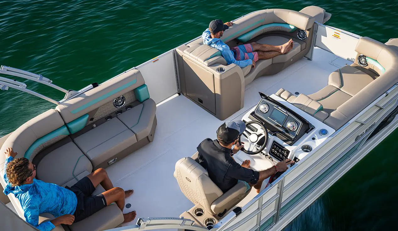 3 friends riding on a hurricane fundeck boat