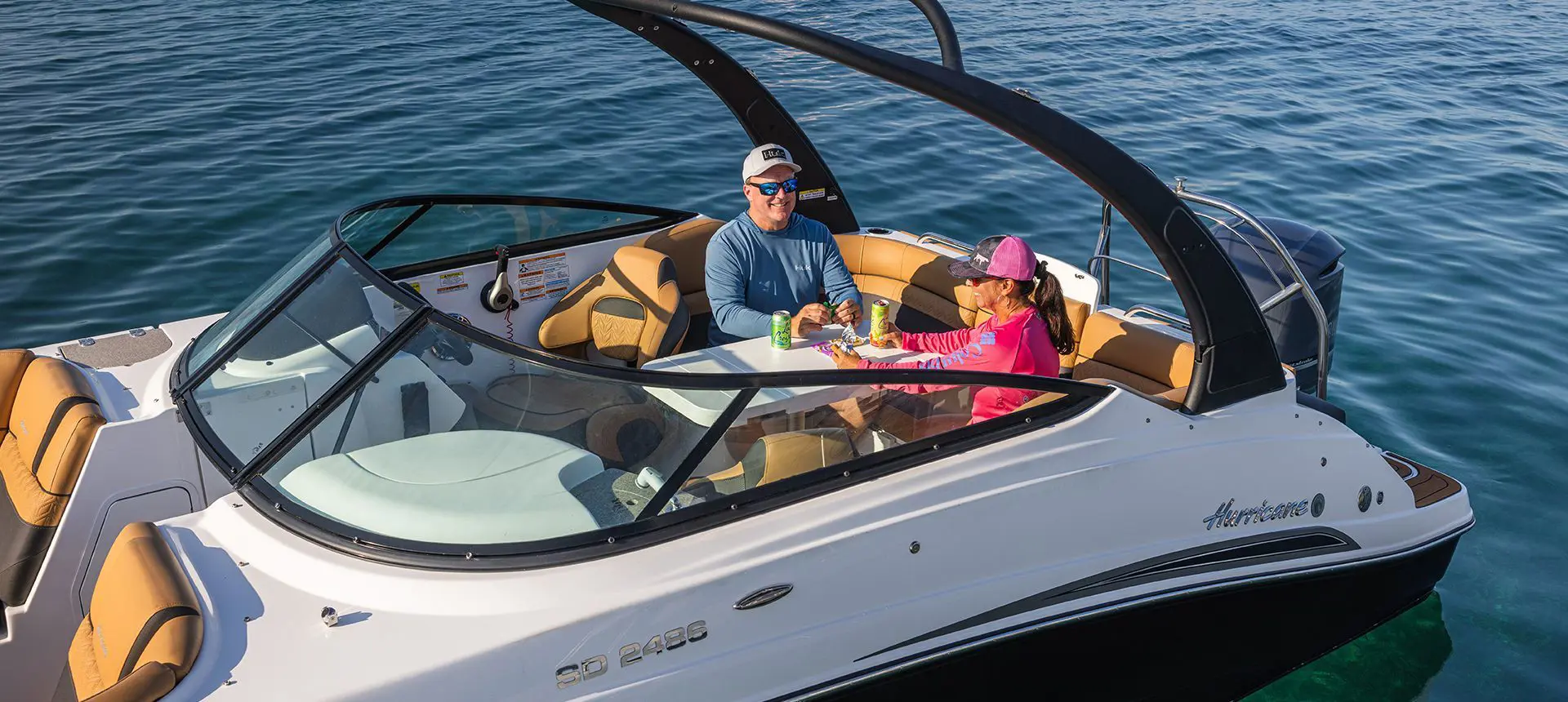 couple having a snack on a hurricane entertainment boat