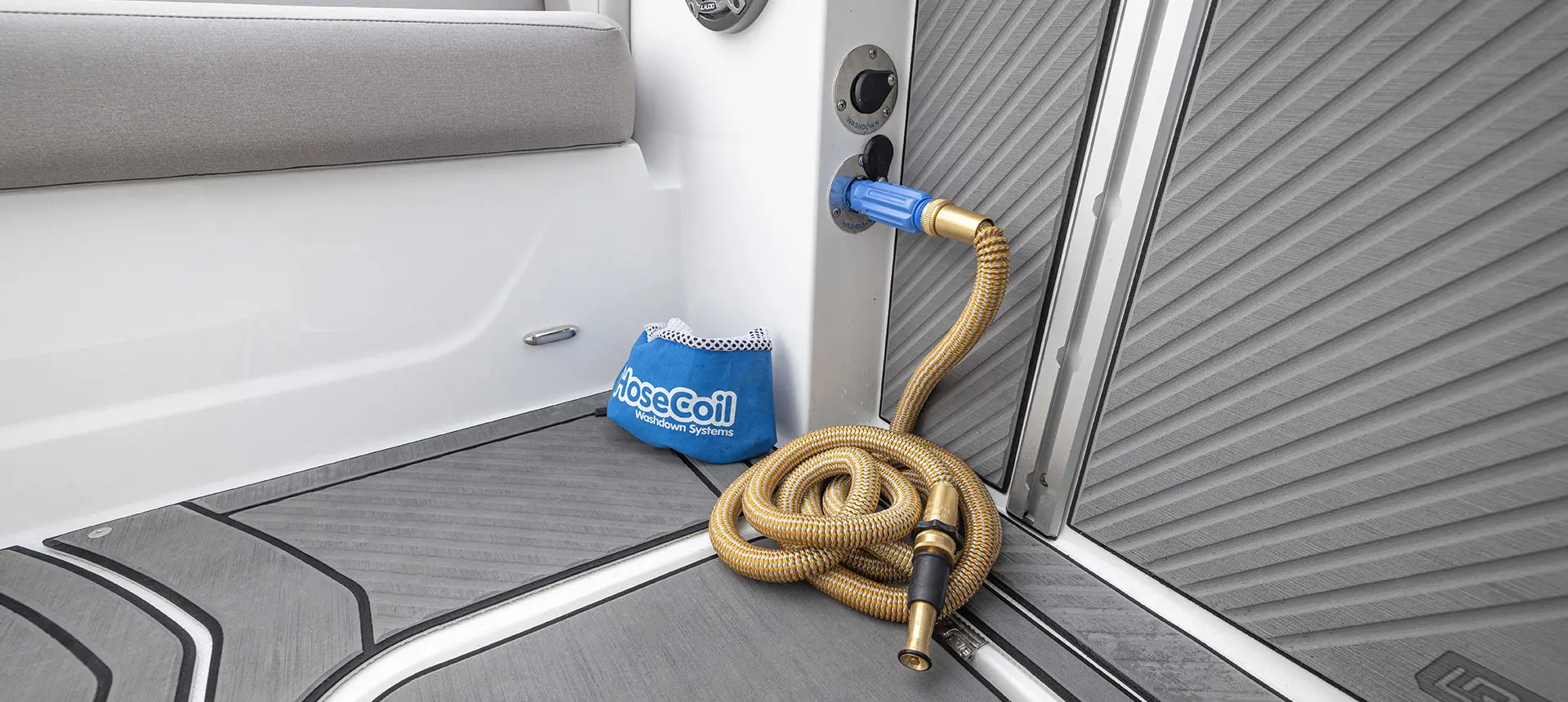HoseCoil washdown system on a Hurricane Center Console fishing deck boat.