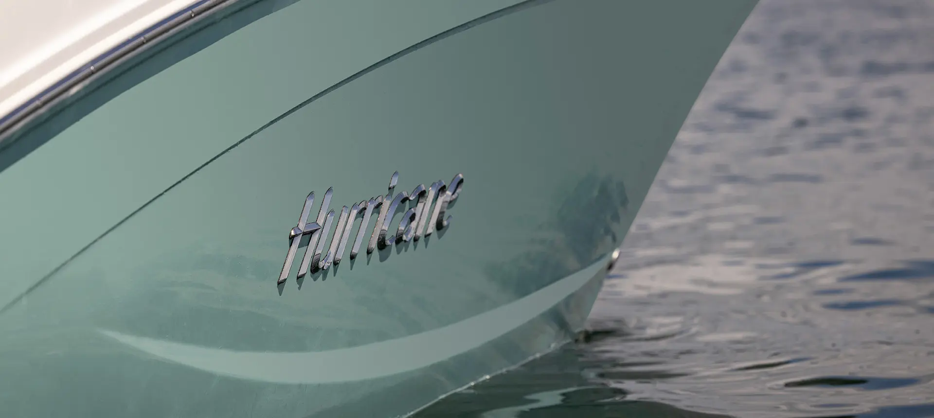 Close up of the badging on a Hurricane Center Console fishing deck boat.