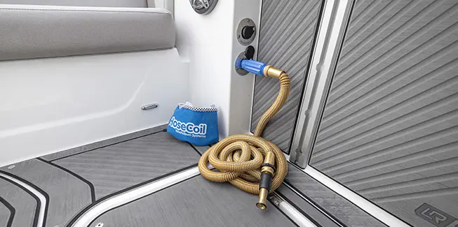 HoseCoil washdown system on a Hurricane Center Console fishing deck boat.