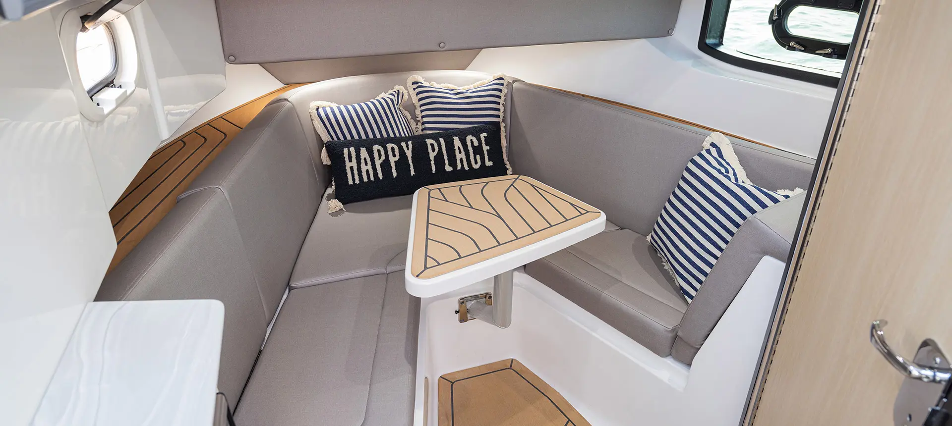 Cabin seating on a Hurricane SunDeck 3200 OB Yacht Series deck boat.
