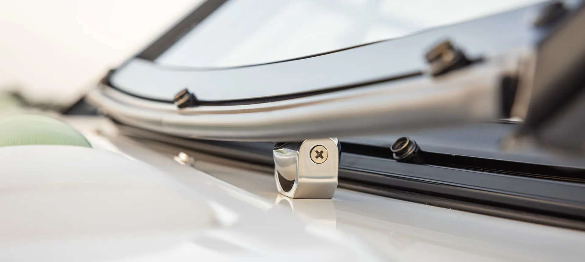Windshield bolt detail on a Hurricane Sundeck 2050 OB.