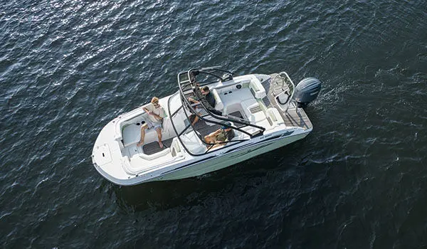 Overhead view of a family cruising lake on a Hurricane Sundeck 2050 OB.