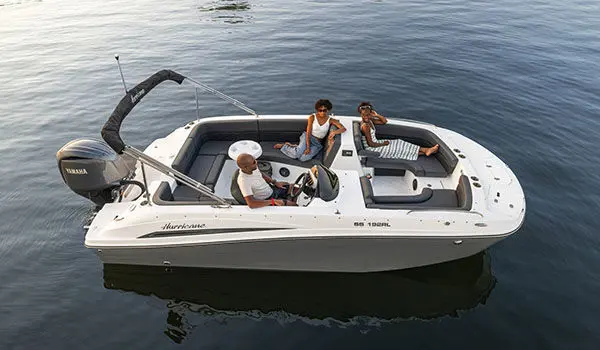 Overhead view of family parked on lake in a Hurricane Sundeck Sport 192 RL OB.