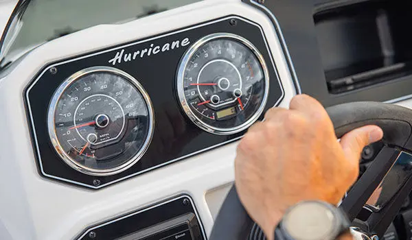 Dashboard gauge detail on a Hurricane Sundeck Sport 2050 OB.