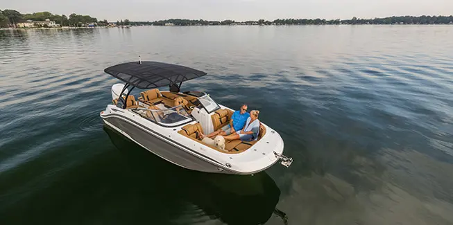 Aerial view of a Hurricane yacht certified deck boat floating on the ocean.
