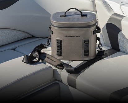 Soft sided Hurricane cooler resting on boat seat. 