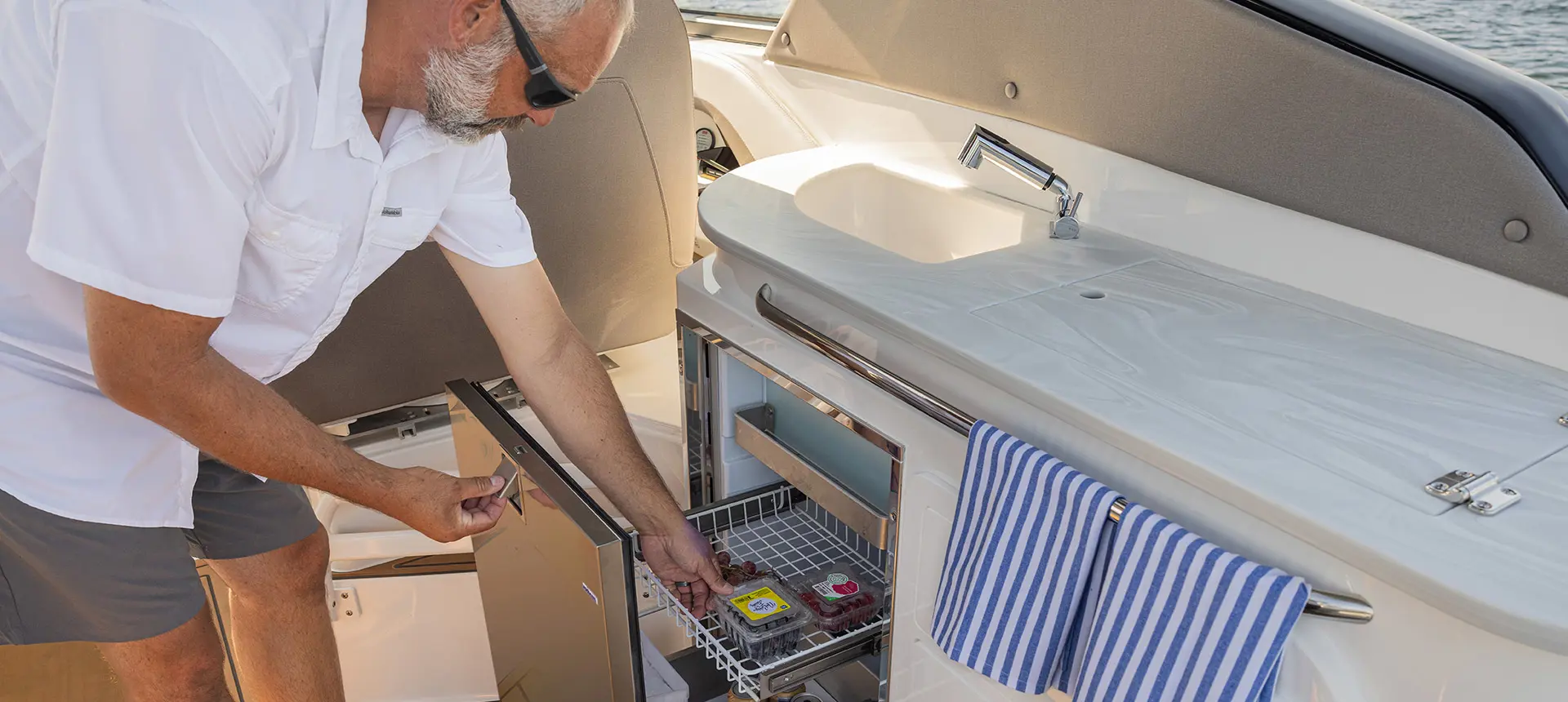 Pull-out fridge on a Hurricane Entertainment deck boat.