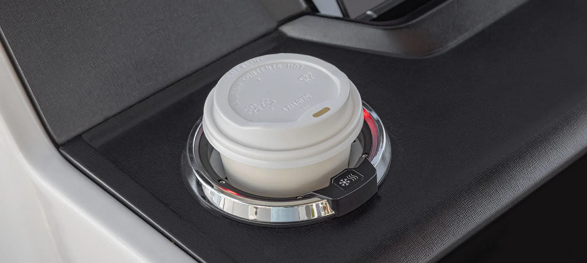 Heated cup holder on the helm of a Hurricane SunDeck OB deck boat.