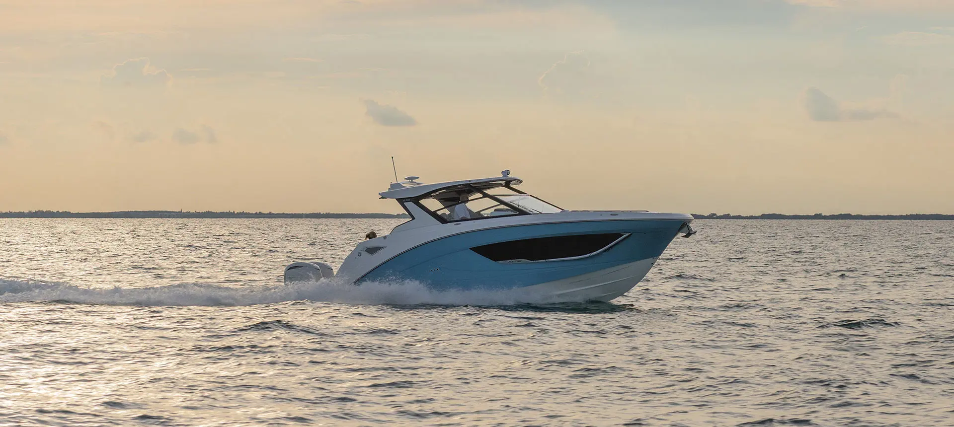 Side profile of a Hurricane Yacht Certified boat cruising across the ocean.