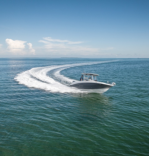 Hurricane Center Console boat showcasing 400 HP while speeing across the water.