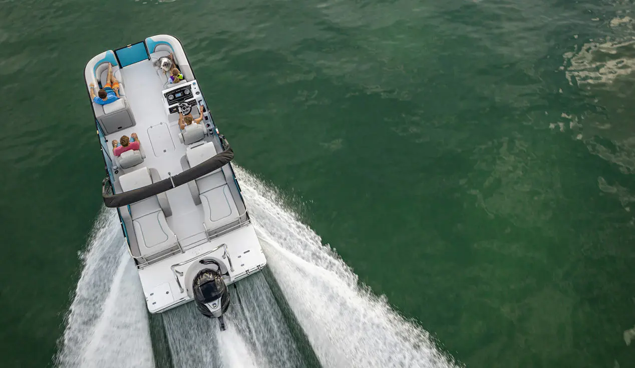 Overhead view of a Hurricane FunDeck boat speeding across the water.