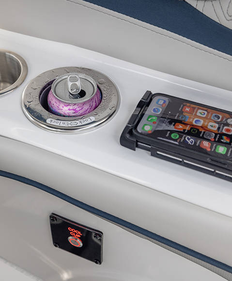 Wireless phone charging dock on a Hurricane SunDeck 2600 Outboard boat.
